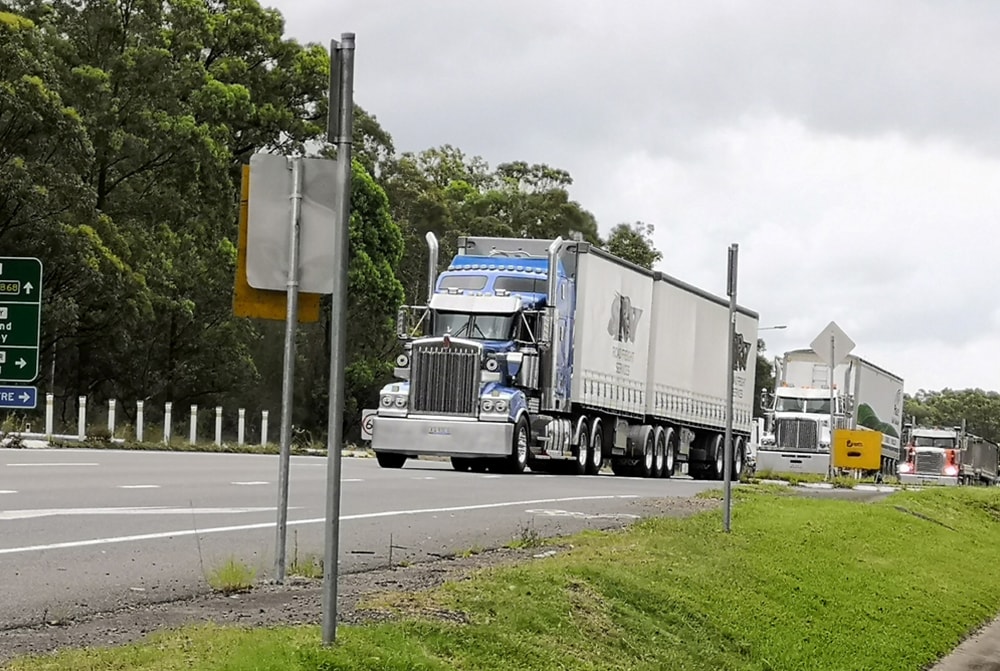 Sydney, NSW, Australia, January 19, 2021. View of the Pacific Highway, trucks on the road