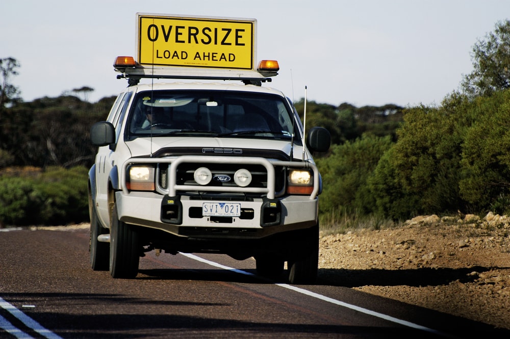 Australia - May 20: Pilot Car Before A Huge Australian